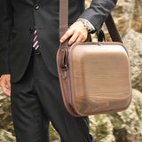 We put shoulder strap to our Brown line. More you use color change every day. Please enjoy the scent of real wood.■ Material: Cedar, cotton canvas, hides, urethane paint (water-repellent finish)■ Size: Approximately W18 X H12 X D2.8 inch, W18 X H15 X D2.8cm (including the handle)■ Weight: Approximately 930 g / 2 lbs■ Specifications: There are 2 middle sizes inner pocket at one side Double fastener make easy open and close B4 size documents storing is possible 17 inches of note PC storing is possible