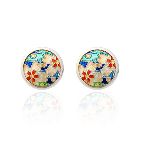 Sakura Blue CufflinksCufflinks made by Ando Shippo AKA Ando Cloisonne since 1880.Wear the Japanese Imperial Warrant of Appointment Cufflinks. They also are perfect gifts for groomsmen, friends, and husbands!These Cufflinks are hand made in Japan from high-quality sturdy rhodium with Cloisonne. The cufflinks will come in a beautiful cufflink box.