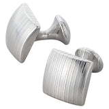 SUWADA BLACKSMITH WORKS, INC. has developed a new material that is laminated steel, processed in three-dimensional shapes – these products will shine for a hundred years. Skilled craftsmen have cut the layer of laminated steel in vertical lengths for the cuff links, and horizontally for the buttons. After this procedure, they are then polished by hand. This is a very fine example of collaboration for craftsmen who are then able to bring out the character of the new material.