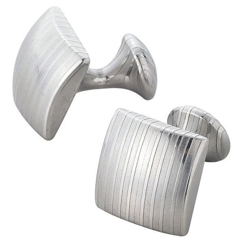 SUWADA BLACKSMITH WORKS, INC. has developed a new material that is laminated steel, processed in three-dimensional shapes – these products will shine for a hundred years. Skilled craftsmen have cut the layer of laminated steel in vertical lengths for the cuff links, and horizontally for the buttons. After this procedure, they are then polished by hand. This is a very fine example of collaboration for craftsmen who are then able to bring out the character of the new material.