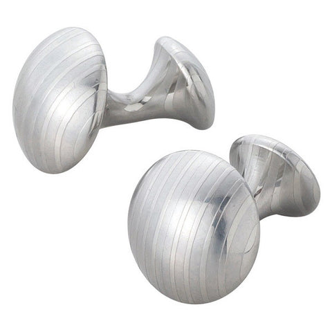 SUWADA BLACKSMITH WORKS, INC. has developed a new material that is laminated steel, processed in three-dimensional shapes – these products will shine for a hundred years. Skilled craftsmen have cut the layer of laminated steel in vertical lengths for the cuff links, and horizontally for the buttons. After this procedure, they are then polished by hand. This is a very fine example of collaboration for craftsmen who are then able to bring out the character of the new material.