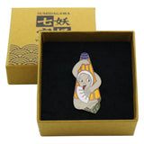 Kasa Bake Lapel Pins Youkai of utensil widely known in pictures and as toys.Although a popular character, no folklore remains. Today, it is typically depicted as an umbrella (kasa) with eyes and nose, but Imado ware mud menko or Funado papierーmachesometimes depict it as a person in disguise acting humorously.